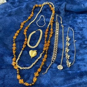 Vintage 7 pc lot marked jewelry. In good condition working clasps and closures.